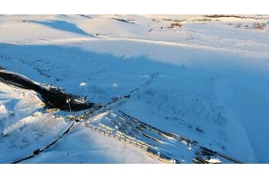 Aerial view of snow covered highway 1806